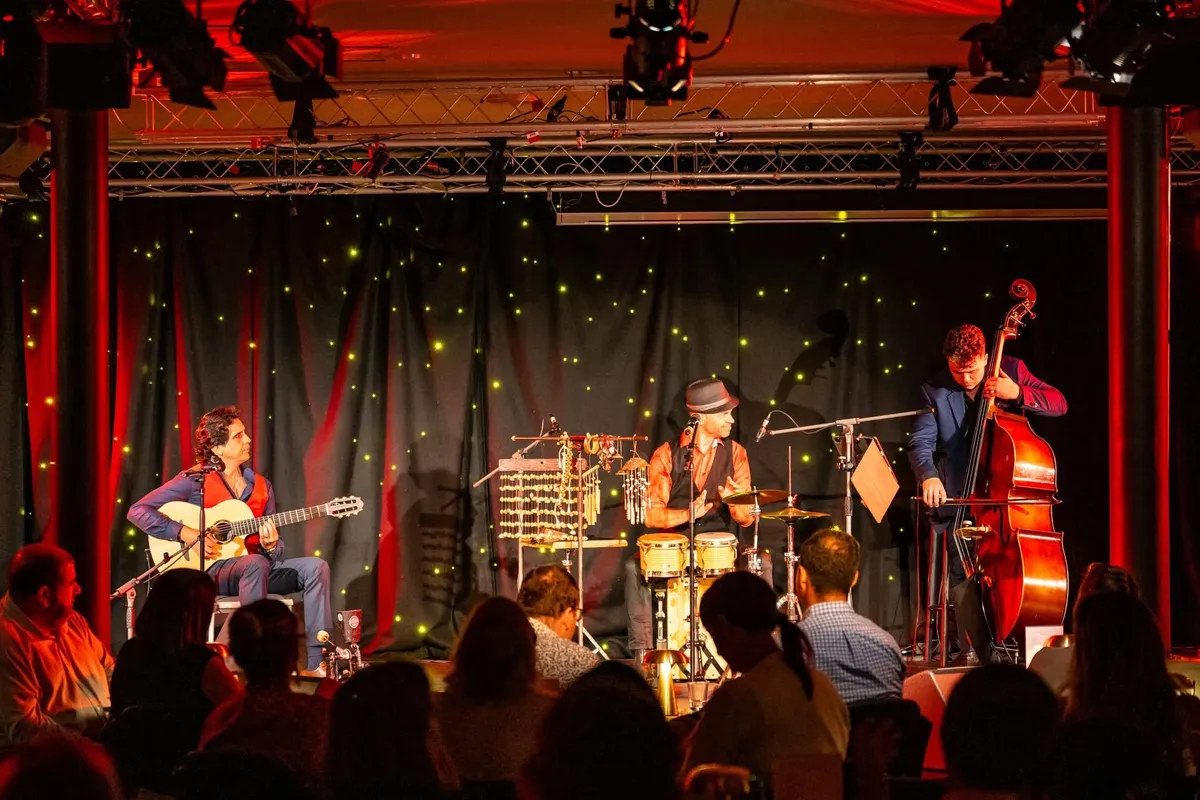Ernesto Castillo’s trio performing to a seated audience
